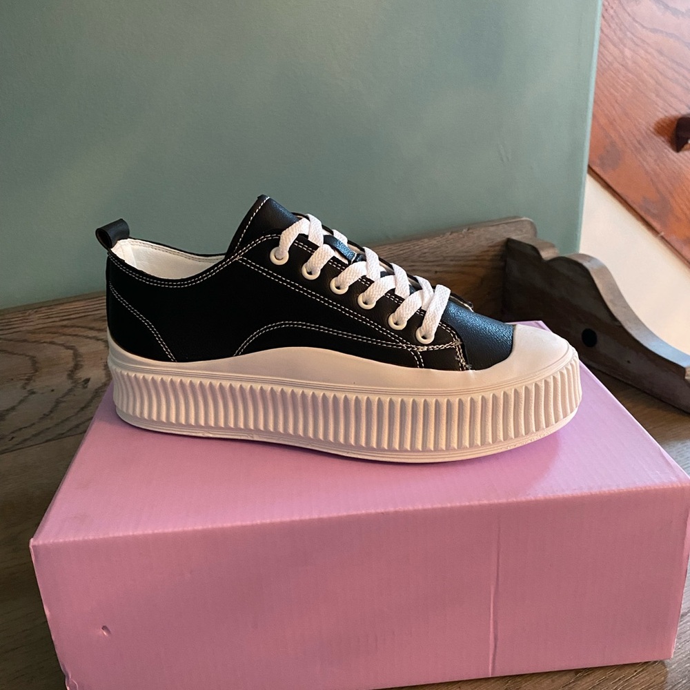 Black and white platform shoes. Brand new. Size 7